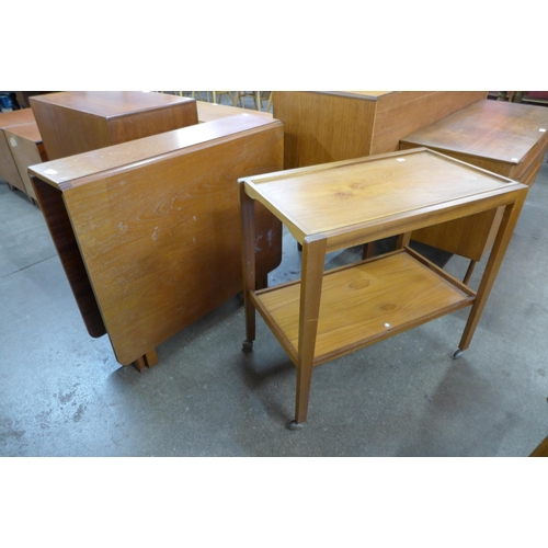 79 - A Jentique teak drop-leaf table and a teak trolley