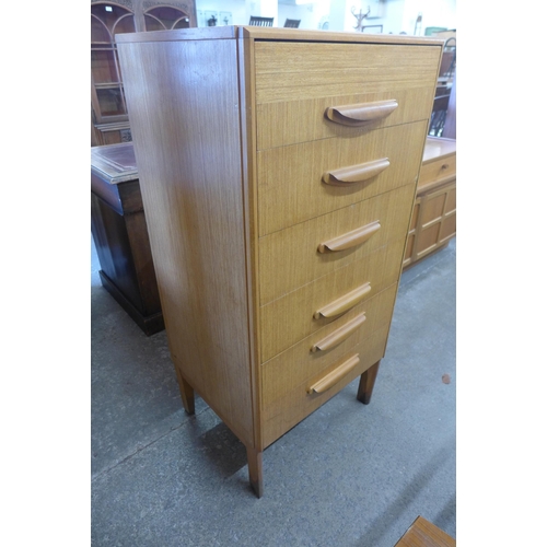 89 - A teak chest of drawers