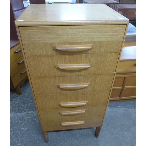 89 - A teak chest of drawers