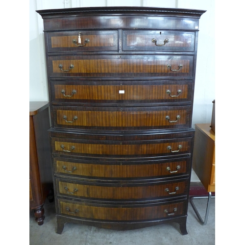 9 - A George III style mahogany bow front chest on chest