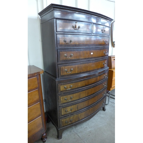 9 - A George III style mahogany bow front chest on chest