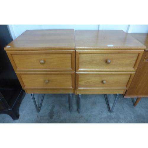 97 - A pair of G-Plan teak chests on chrome stands