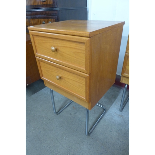 97 - A pair of G-Plan teak chests on chrome stands