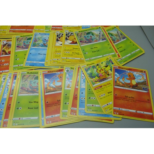 815 - 50 Pokemon cards including Pikachu, Charmander, Squirtle, etc.