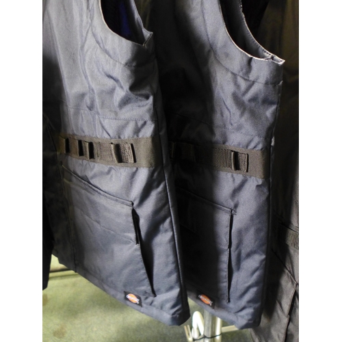 3070 - Four men's Dickie's navy utility bodywarmers - size L * this lot is subject to VAT