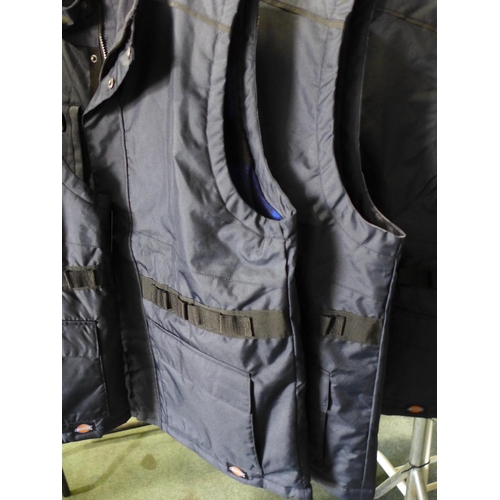 3071 - Four men's Dickie's navy utility bodywarmers - size XL * this lot is subject to VAT