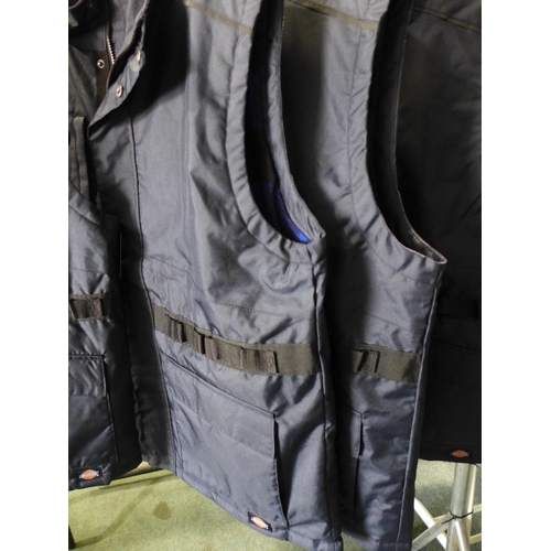 3073 - Four men's Dickie's navy utility bodywarmers - size XL * this lot is subject to VAT