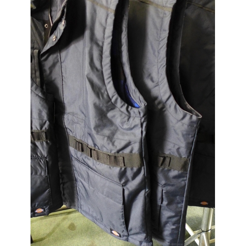 3075 - Four men's Dickie's navy utility bodywarmers - size XL * this lot is subject to VAT