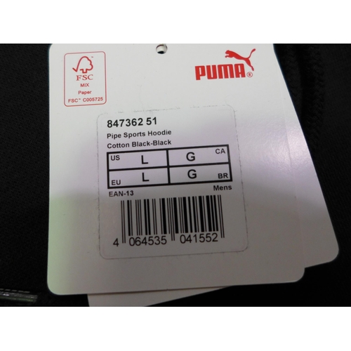 3107 - A quantity of men's black Puma hoodies - mixed sizes * this lot is subject to VAT