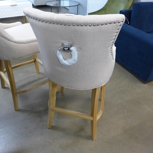 1317 - A pair of Bradley oatmeal upholstered bar stools