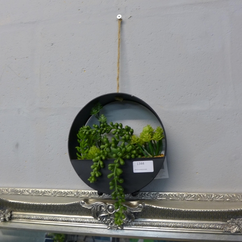 1344 - A display of artificial succulents in a round metal hanging pot, H 20cms (67444212)   #