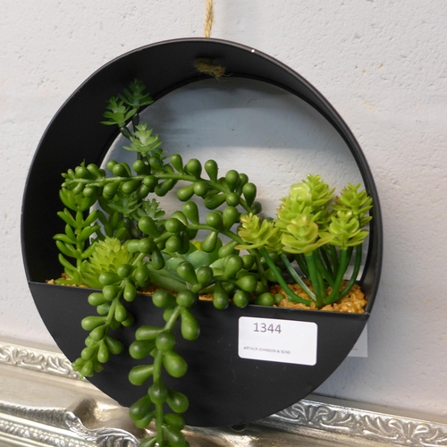 1344 - A display of artificial succulents in a round metal hanging pot, H 20cms (67444212)   #