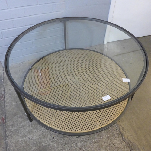 1407 - A circular glass top coffee table with rattan detail