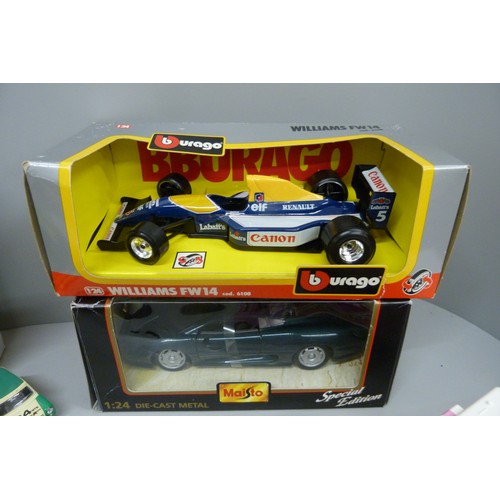 701A - Two boxed model vehicles, Maisto and Burago, a model tractor, burger van, six model Mini Coopers and... 