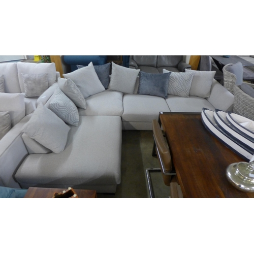 1388 - A light stone upholstered LHF corner sofa