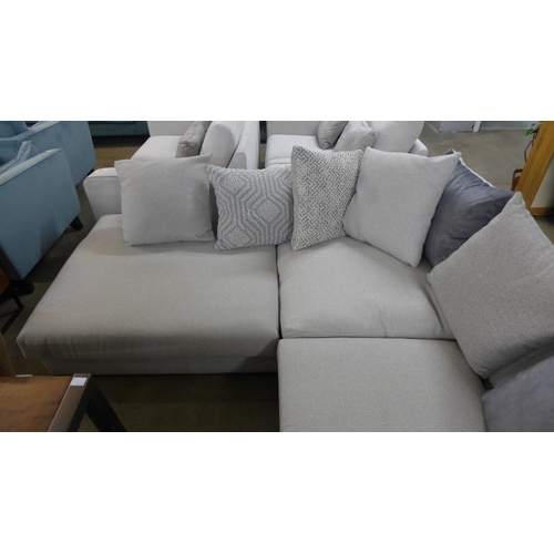 1388 - A light stone upholstered LHF corner sofa