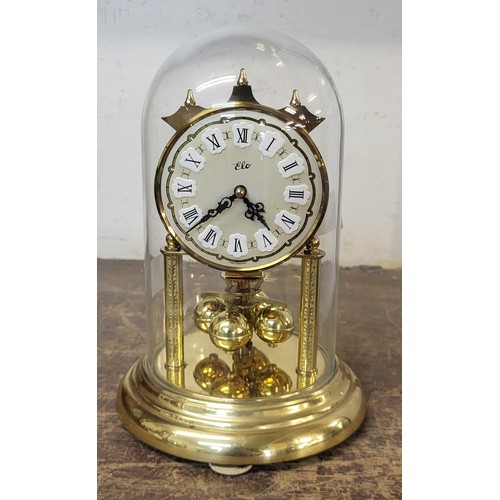 343 - A West German Elo brass anniversary clock