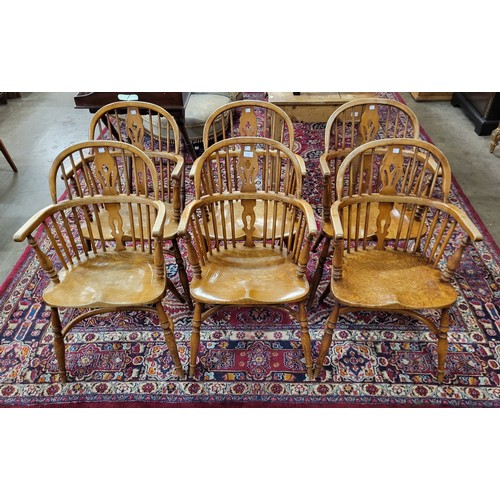 13 - A set of six 19th Century elm and beech Windsor chairs