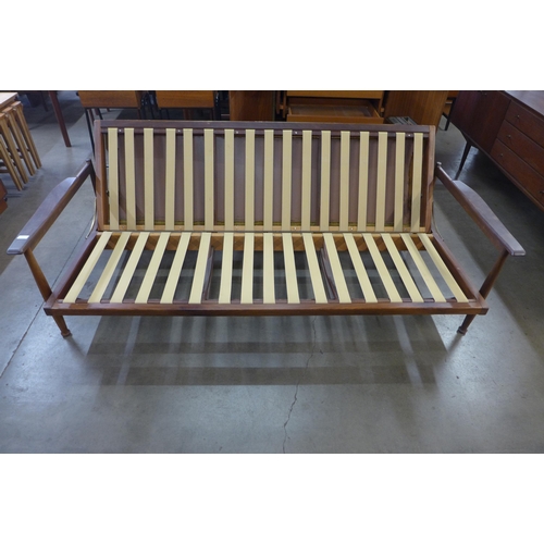 1 - A Guy Rogers teak Manhattan sofa bed, designed by George Fejer and Eric Phamphilon