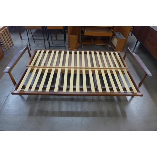 1 - A Guy Rogers teak Manhattan sofa bed, designed by George Fejer and Eric Phamphilon