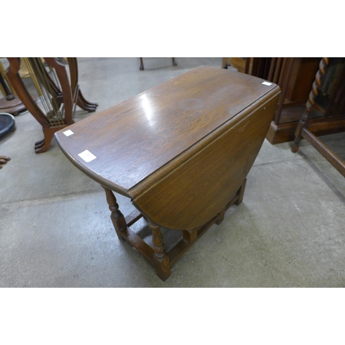 104 - An Old Charm oak gateleg occasional table