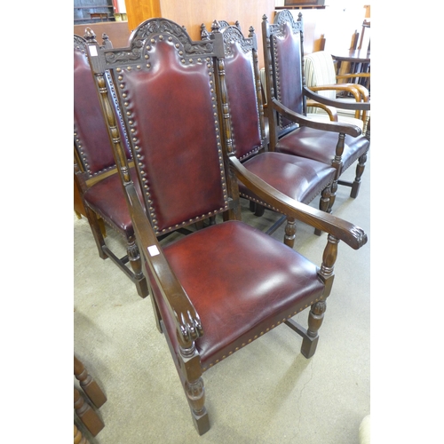 115 - A set of six Jaycee carved oak and burgundy leather dining chairs