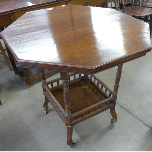 117 - A Victorian Aesthetic Movement rosewood octagonal centre table, H.W. Batley for Gregory & Co. 212 & ... 