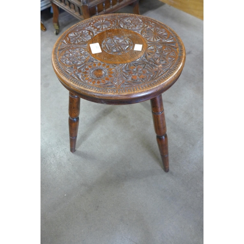 120 - A Victorian chip carved walnut circular occasional table