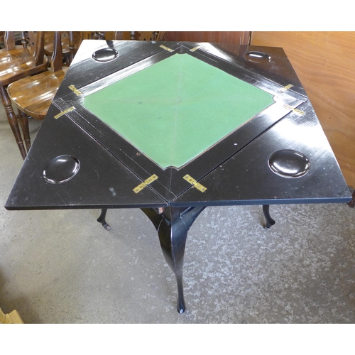 127 - An Edward VII ebonised envelope card table