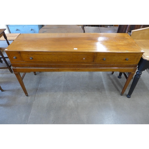 131 - A George IV inlaid mahogany three drawer serving table