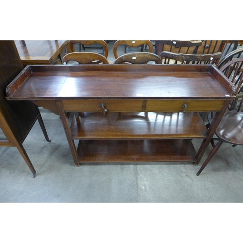 134 - An Edward VII mahogany two drawer side table