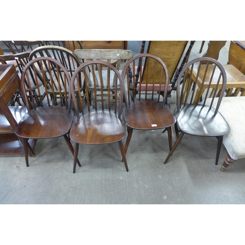 135 - Four Ercol dark elm and beech Windsor chairs