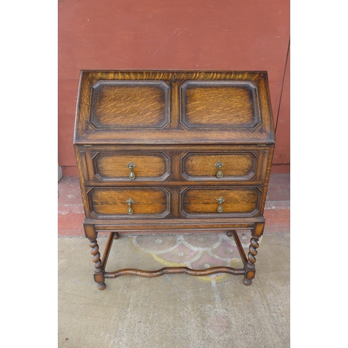 145B - An early 20th Century oak barleytwist bureau