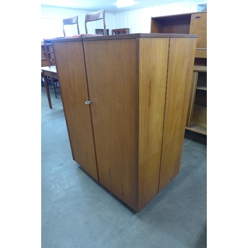 18 - A Newcraft Ltd. teak home office cabinet