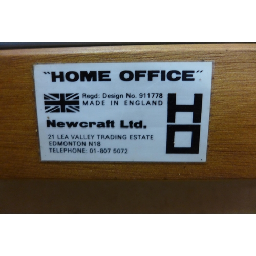 18 - A Newcraft Ltd. teak home office cabinet