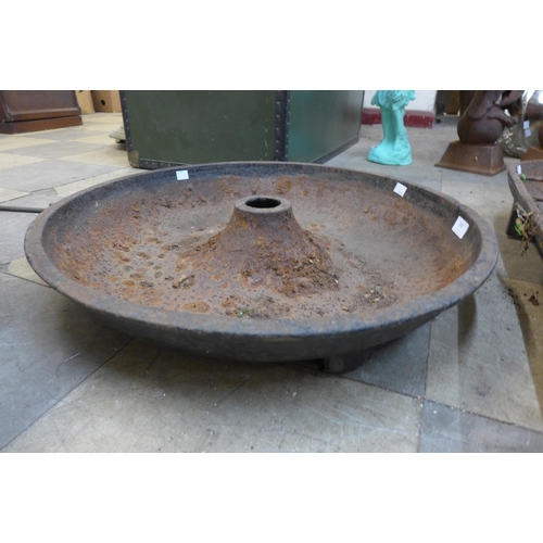 202 - A small cast iron Mexican hat pig feeding trough