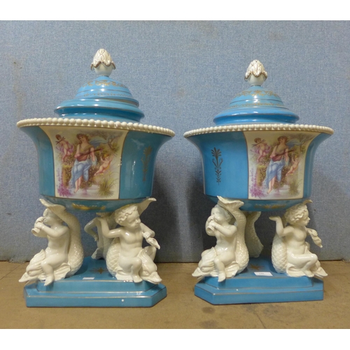 240 - A pair of 19th Century style continental porcelain vases and covers