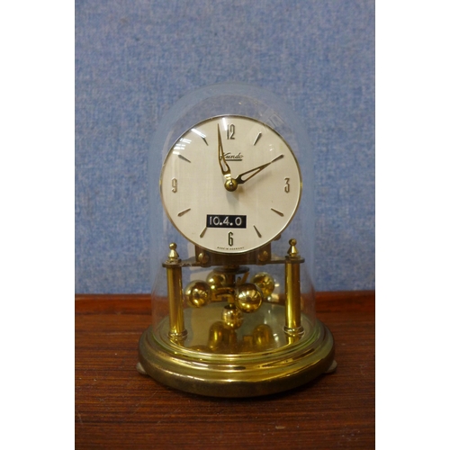 243 - A small gilt anniversary clock