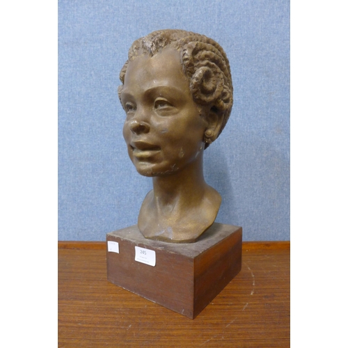 245 - A French plaster bust of a lady