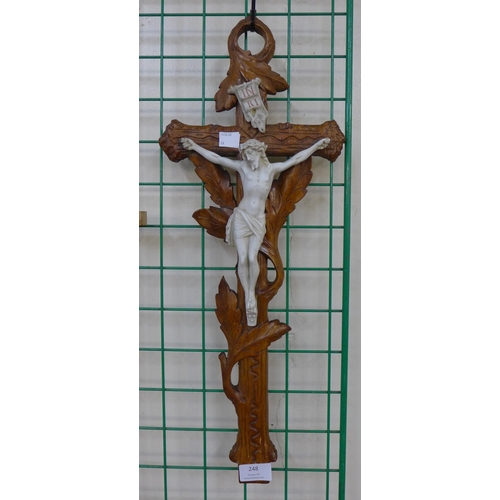 248 - A French carved wood and faux ivory crucifix