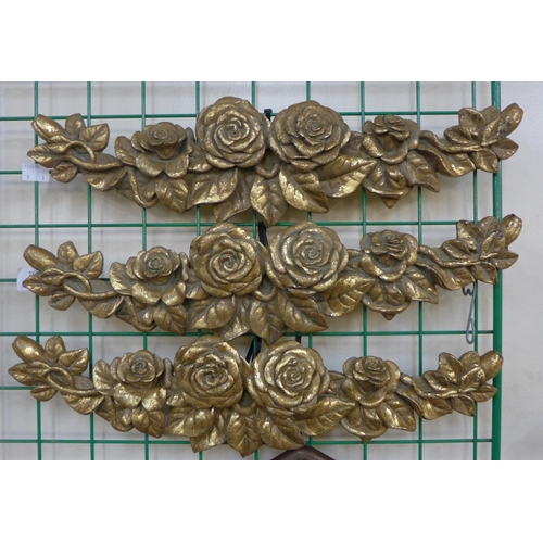 250 - A set of three French gilt floral appliques