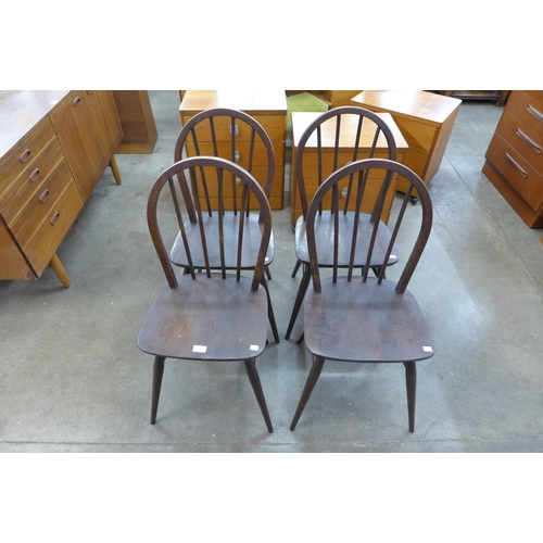 26 - A set of four Ercol dark elm and beech Windsor chairs