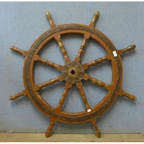 261 - A teak ship's wheel