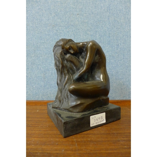 264B - An Art Nouveau style bronze figure of a keeling female nude