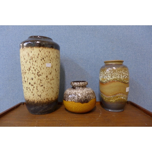 265 - Three West German brown and ochre glazed pottery vases