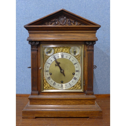 269 - A 19th Century German Winterhalder & Hofmeier carved oak bracket clock