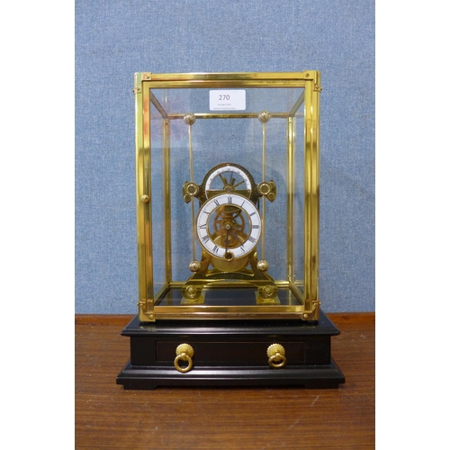 270 - A cased gilt metal grasshopper skeleton clock