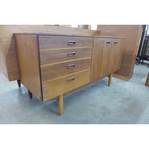 28 - A tola wood sideboard