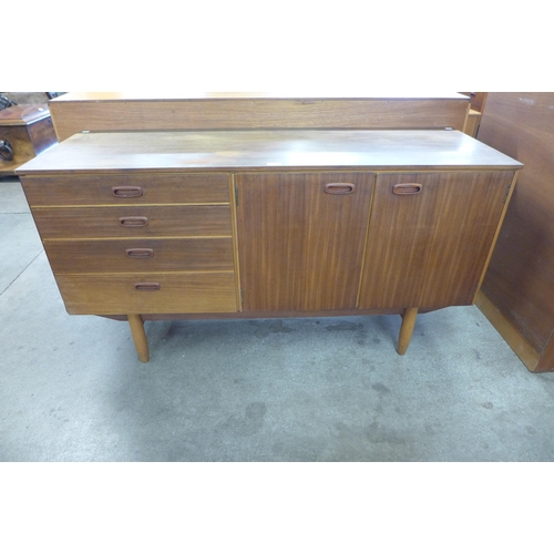 28 - A tola wood sideboard