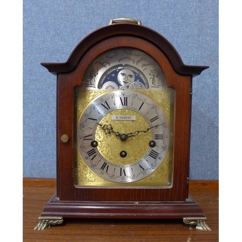 285 - A German mahogany mantel timepiece